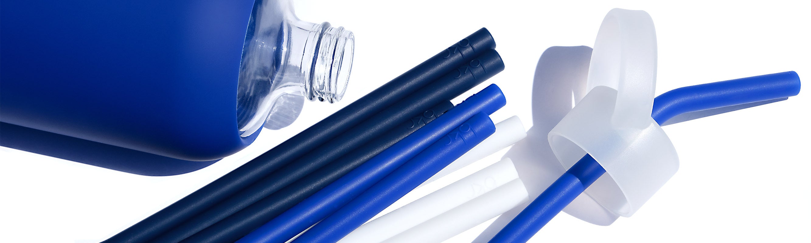 bkr glass and silicone water bottles with straw caps called Sip Kits