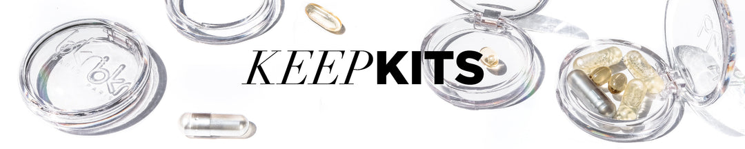 multiple clear containers that snap onto the top of specific bkr bottle caps that hold vitamins, pills or other small items that you need on the daily.