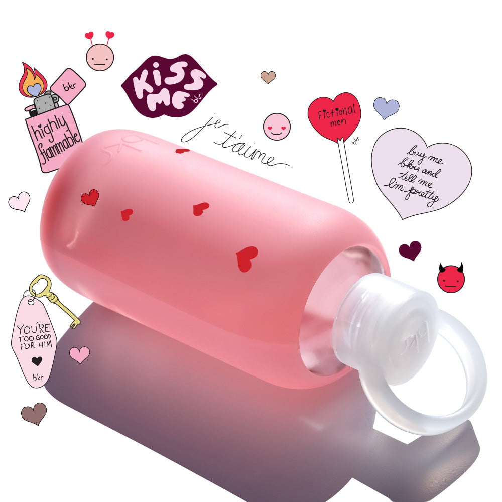 Reusable glass and silicone water bottles in sheer sugary warm pink with tiny red hearts print.