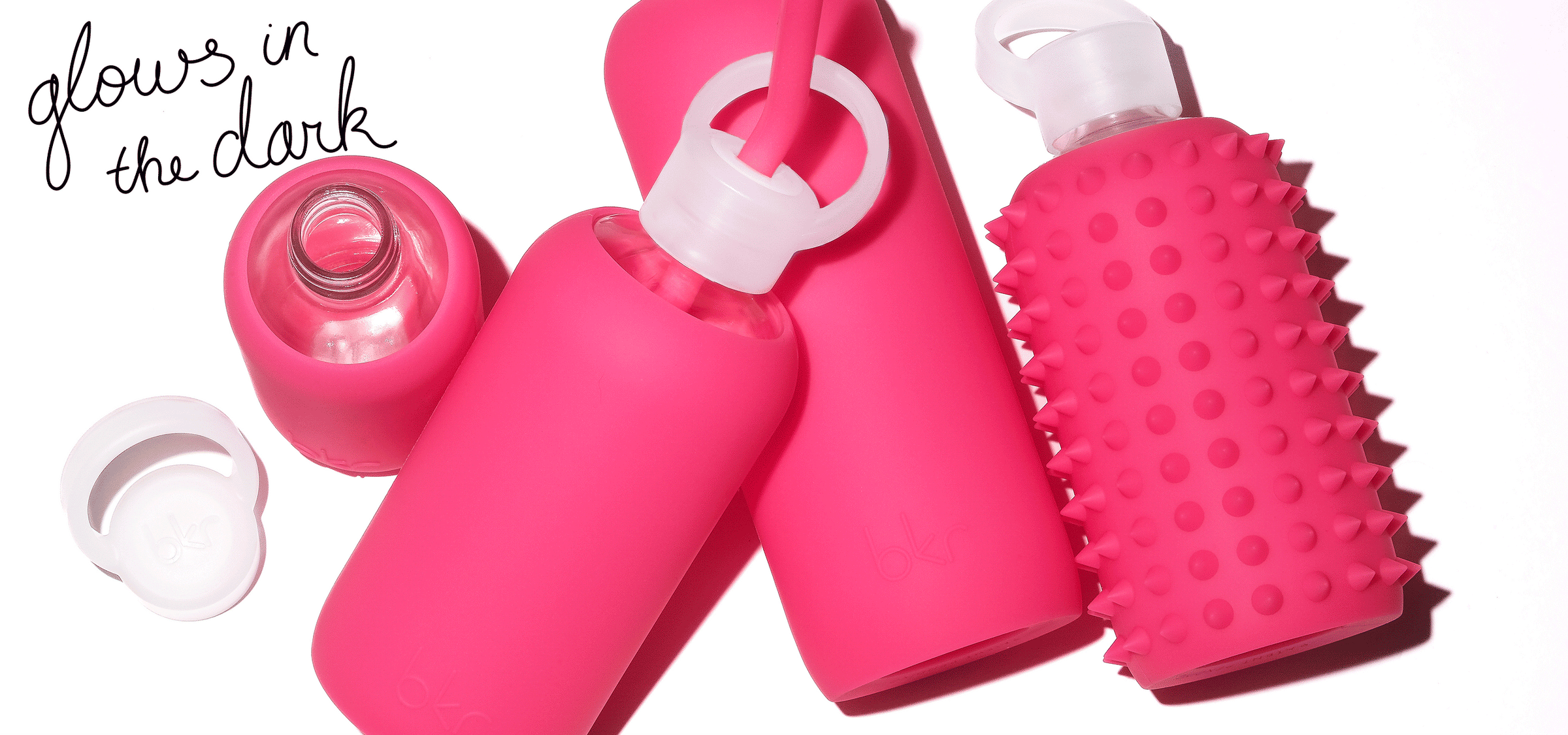 Hot Pink Glow in the Dark bkr glass water bottles with non-toxic lead free silicone sleeves