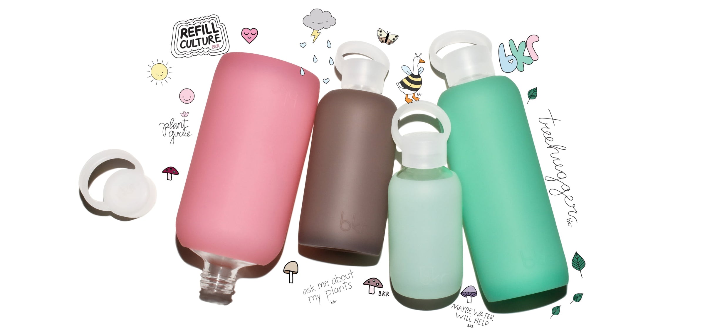 bkr Earth Day stickers with glass and silicone reusable water bottles in sheer sugary warm pink, sheer malt coco brown, sheer mint sea glass, and sheer tropical shallow sea green.