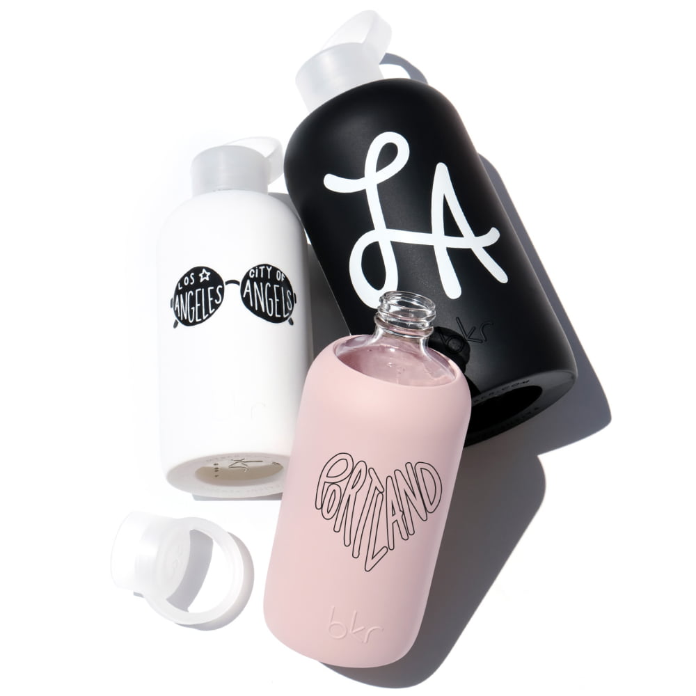 bkr glass and silicone water bottles in different colors with different location prints