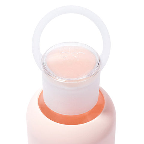 Navigation button for bkr kiss kits: glass water bottles with water balm integrated into the cap 