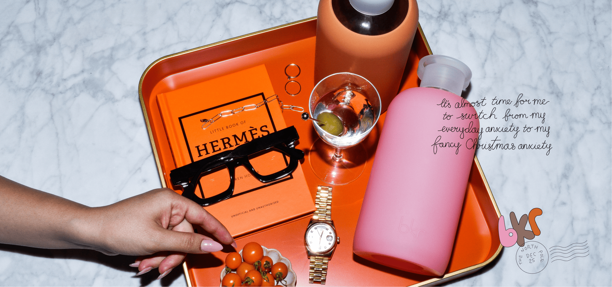 bkr reusable glass and silicone water bottles in opaque earthy ginger terracotta and sheer sugary warm pink.